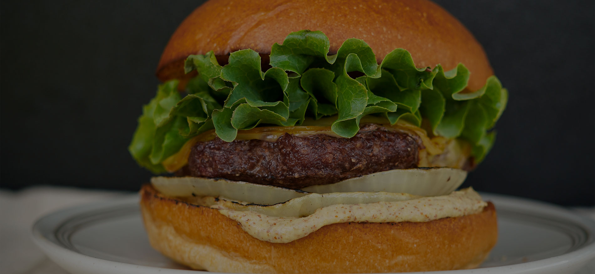 https://bubbafoods.com/wp-content/uploads/2022/08/Smoked-Gouda-Grass-Fed-BUBBA-Burger-hero-image.jpg